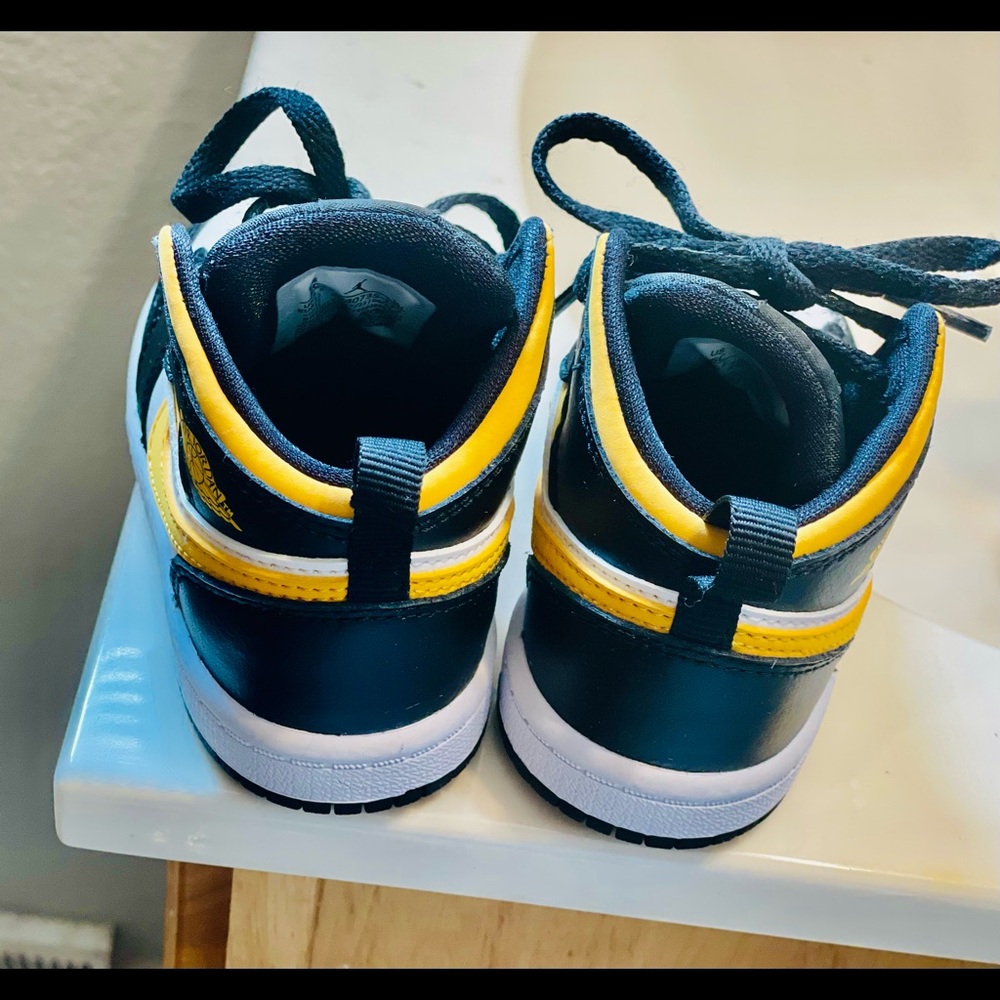 Black yellow and white infants Jordan 1s only worn twice size 6c